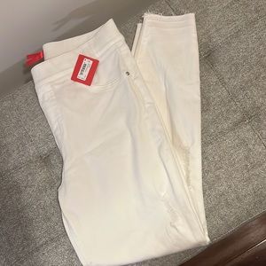 SOLD.  SPANX distressed skinny jeans size Large